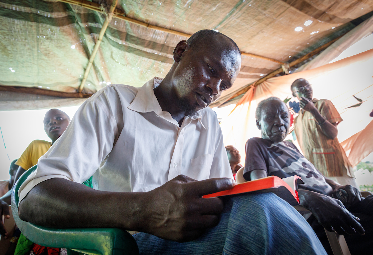 Man reading Scripture